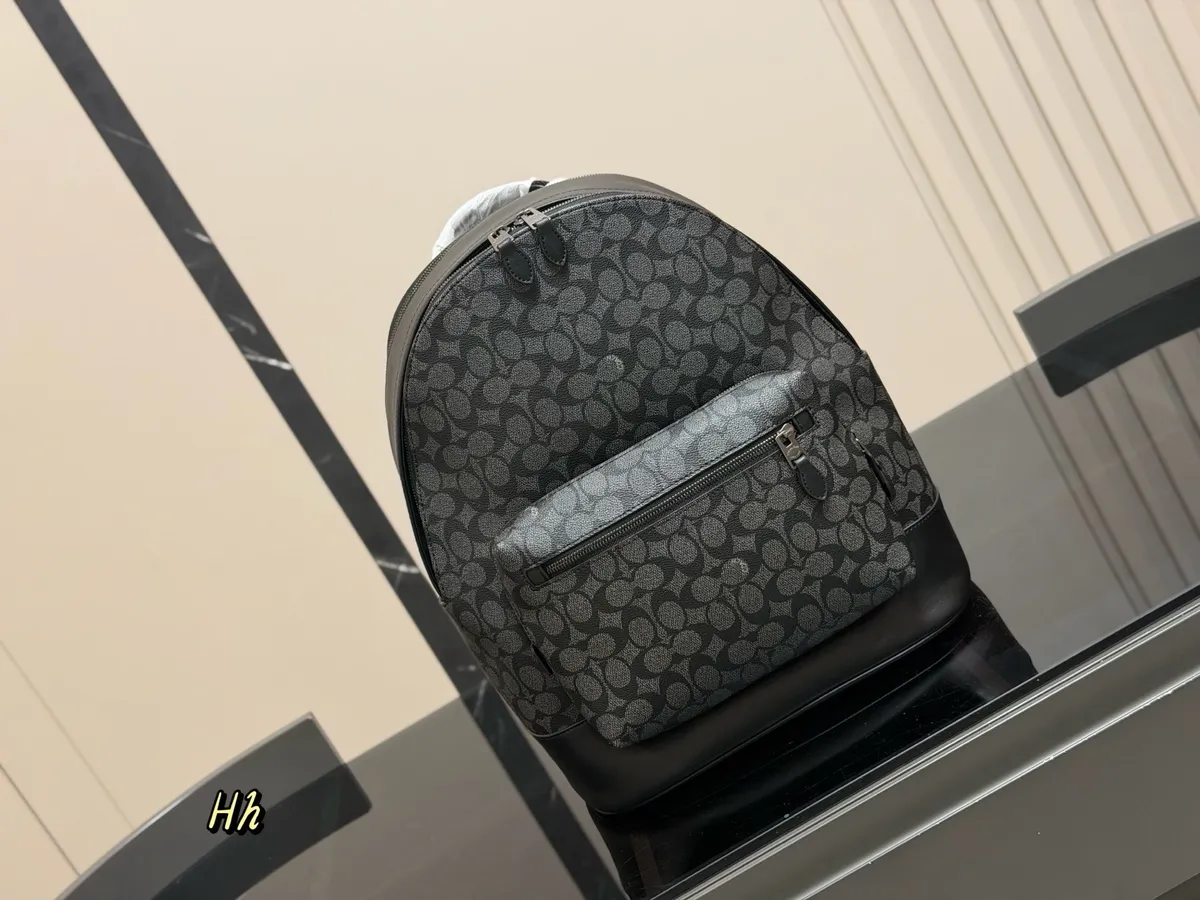 Coach Backpack - 33 × 39 cm — source photograph 1 of 3