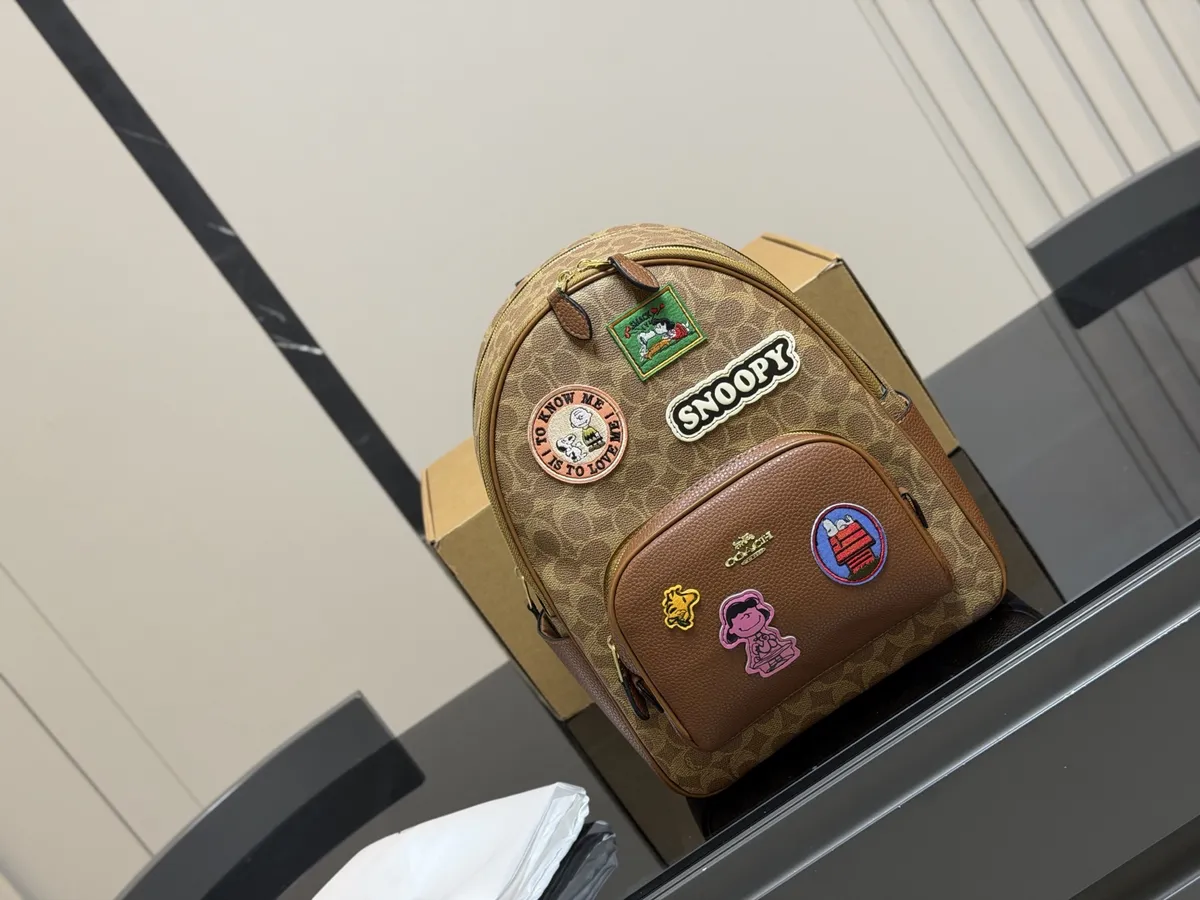 Coach Canvas Backpack - 27 × 33 cm — source photograph 1 of 3
