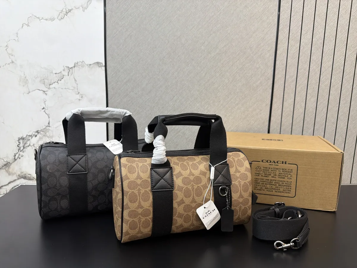 Coach Canvas Monogram Top Handle Bag - 27 × 17 cm — source photograph 1 of 3