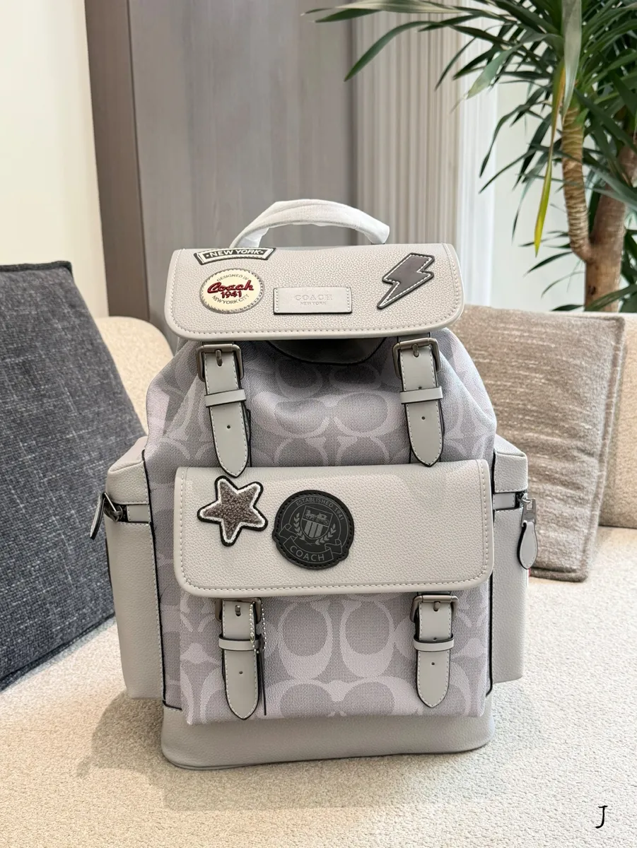 Coach Canvas Printed Backpack - 29 × 45 × 16.5 cm — source photograph 1 of 3