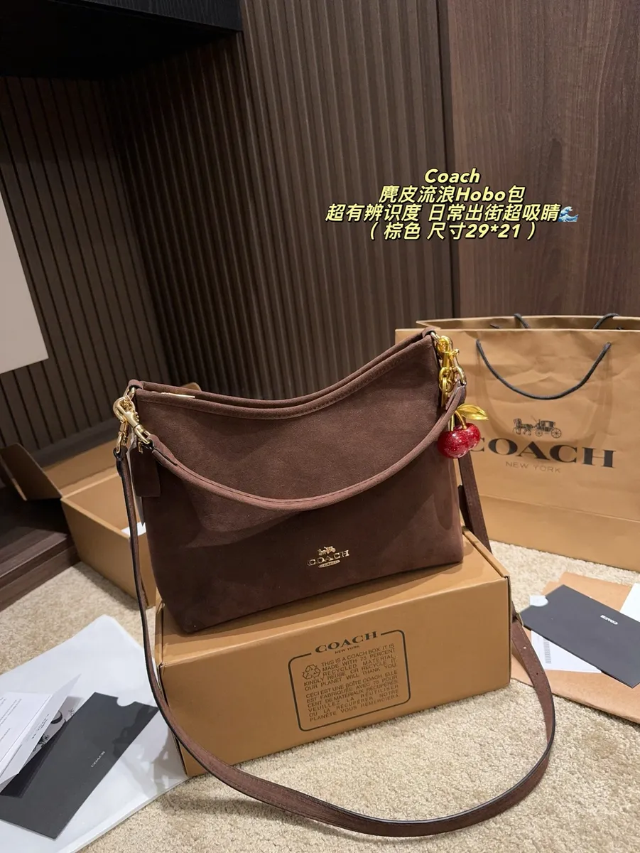 Coach Denim Suede Crossbody Bag — source photograph 1 of 3