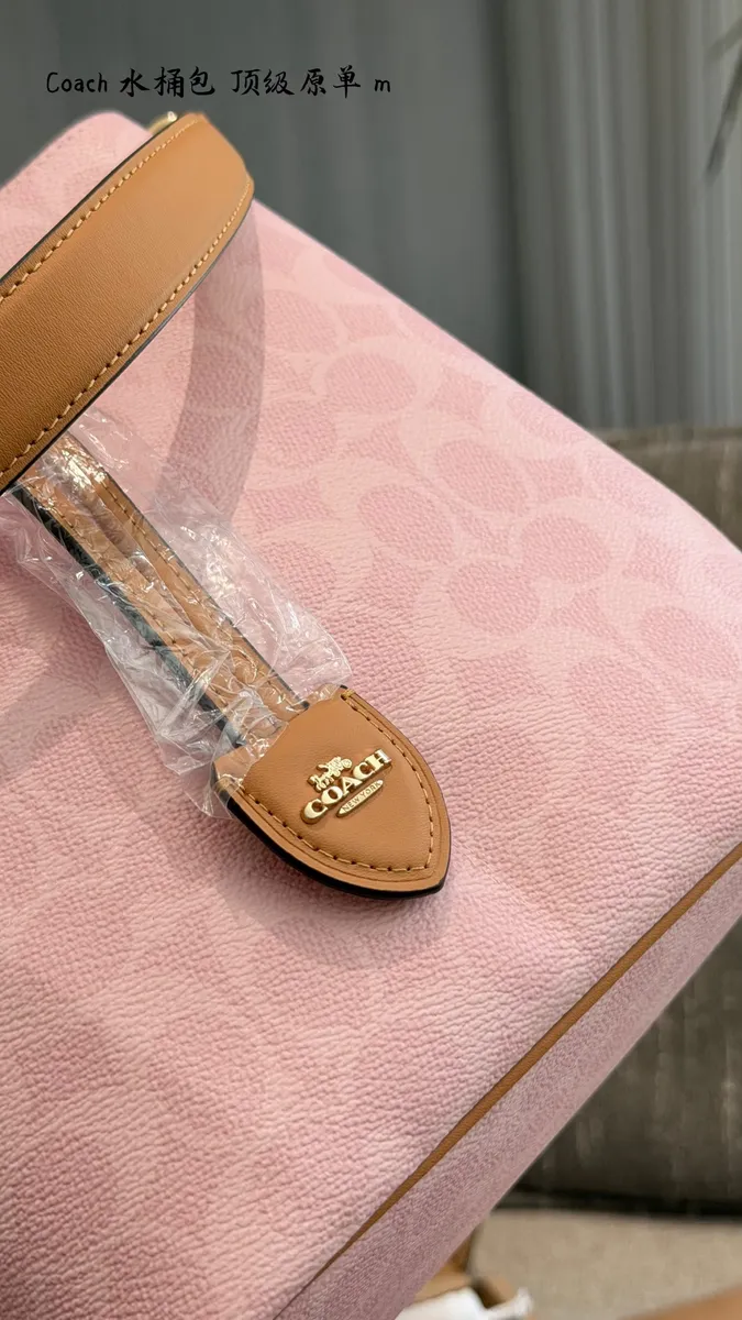 Coach Monogram Bucket Bag — source photograph 1 of 3
