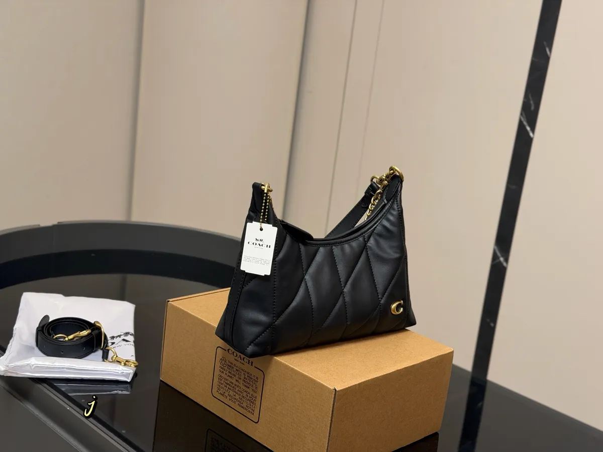 Coach Monogram Mini Bag - 25 cm — source photograph 1 of 3