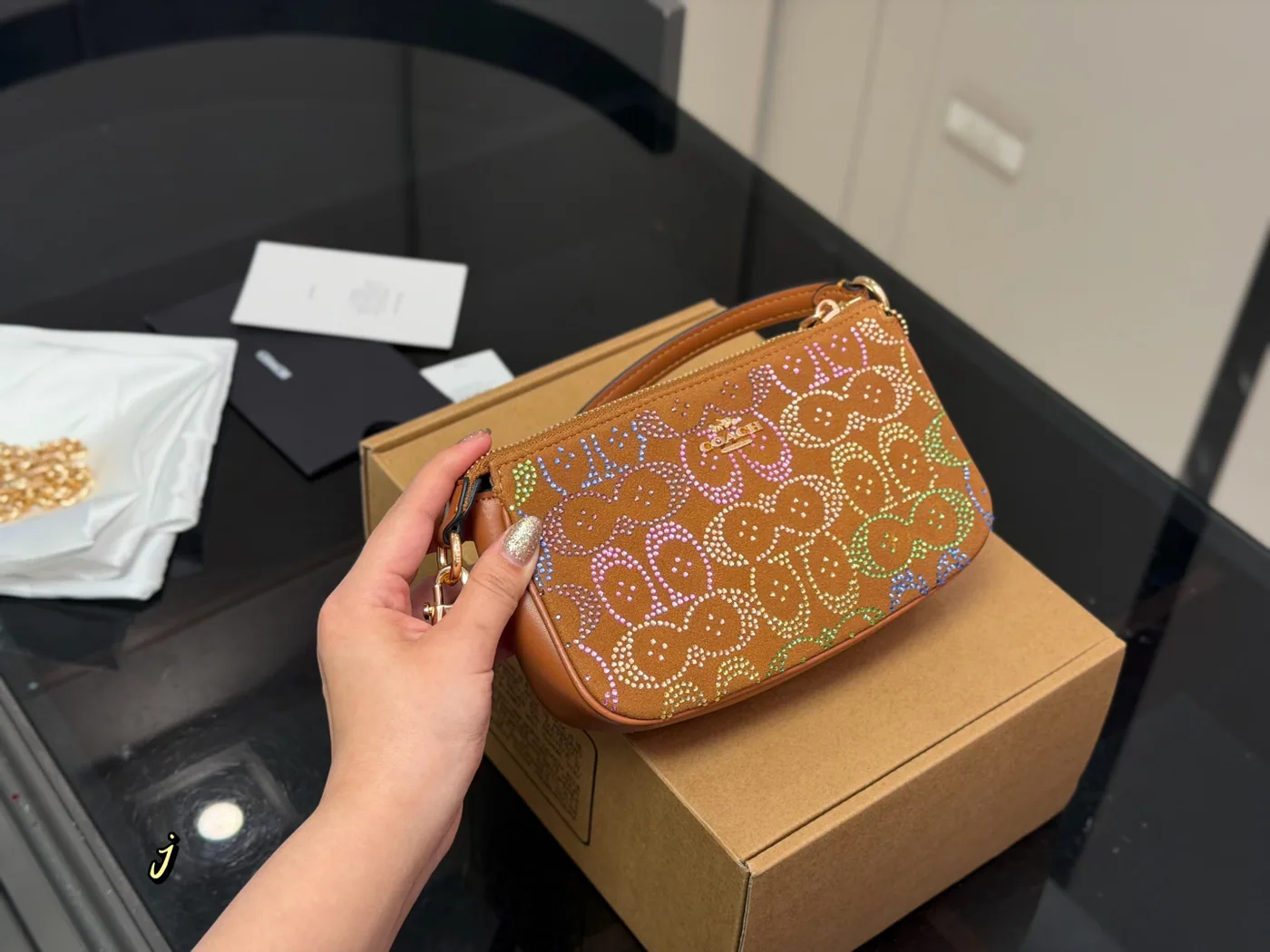 Coach Nolita 19 Shoulder Bag, tan with multicolour pattern — front patterned view