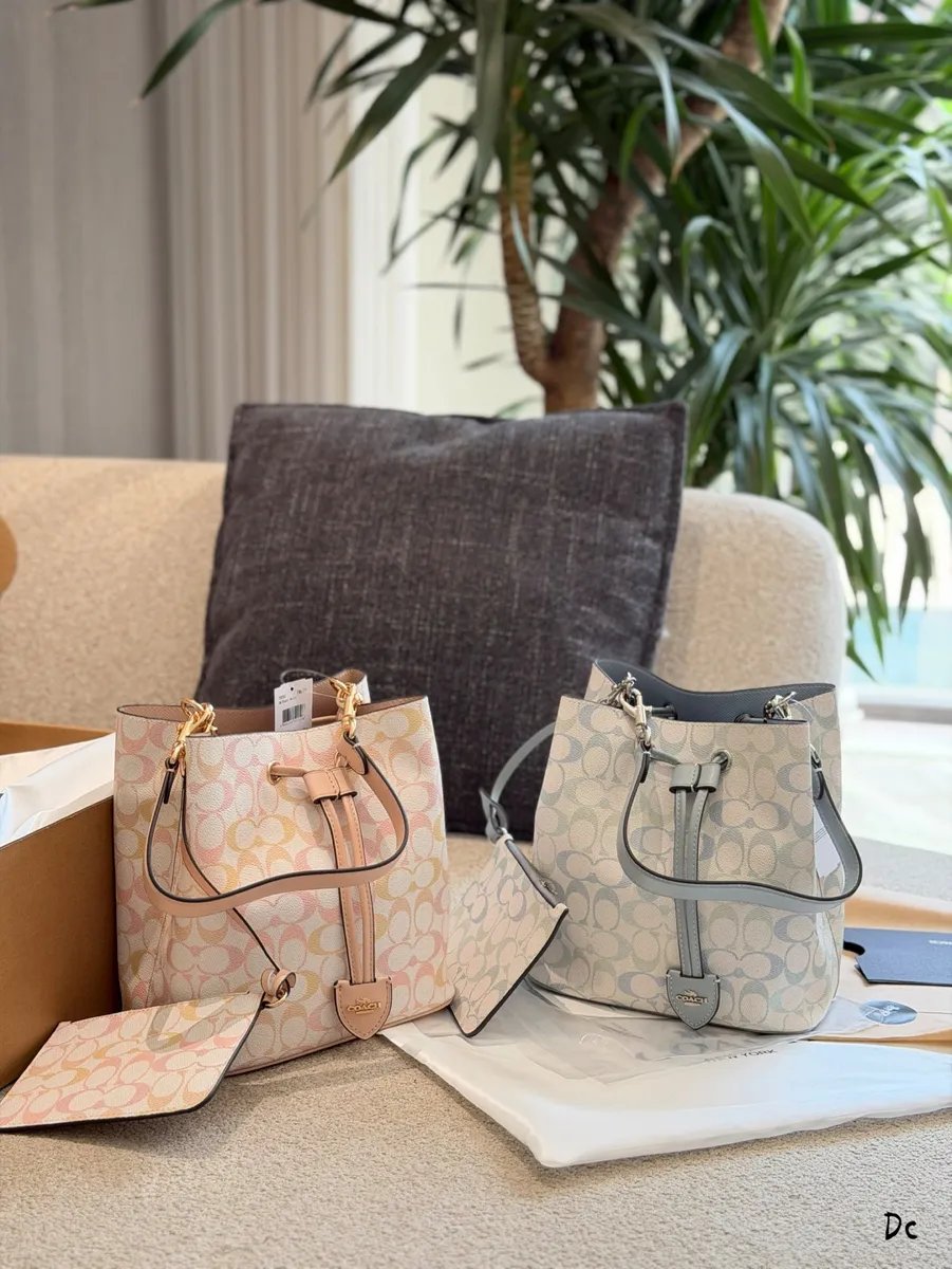 Coach Rowan Canvas Monogram Bucket Bag - 22 × 14 × 22 cm — source photograph 1 of 3
