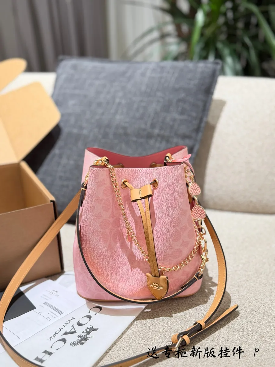 Coach Rowan Canvas Monogram Bucket Bag — source photograph 1 of 3
