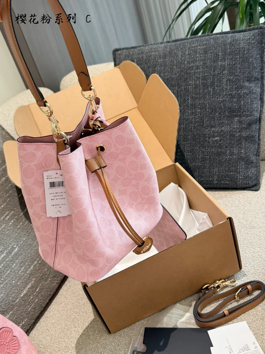 Coach Rowan Monogram Drawstring Bucket Bag - 17.5 × 12 × 10 cm — source photograph 1 of 3