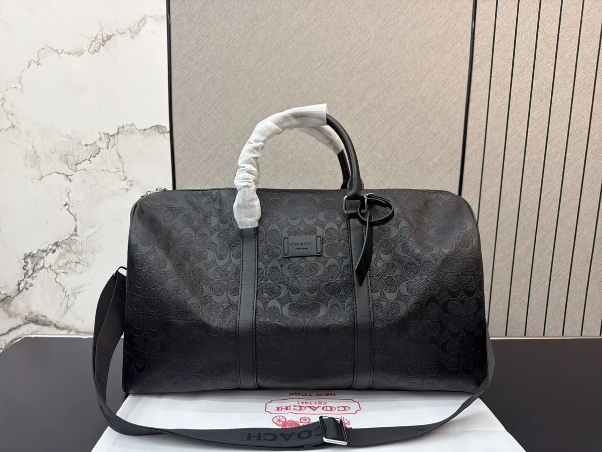 Coach Travel Bag - 50 × 27 cm — source photograph 1 of 3