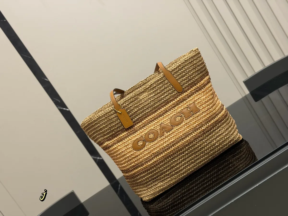 Coach Woven Handbag - 32 × 30 cm — source photograph 1 of 3