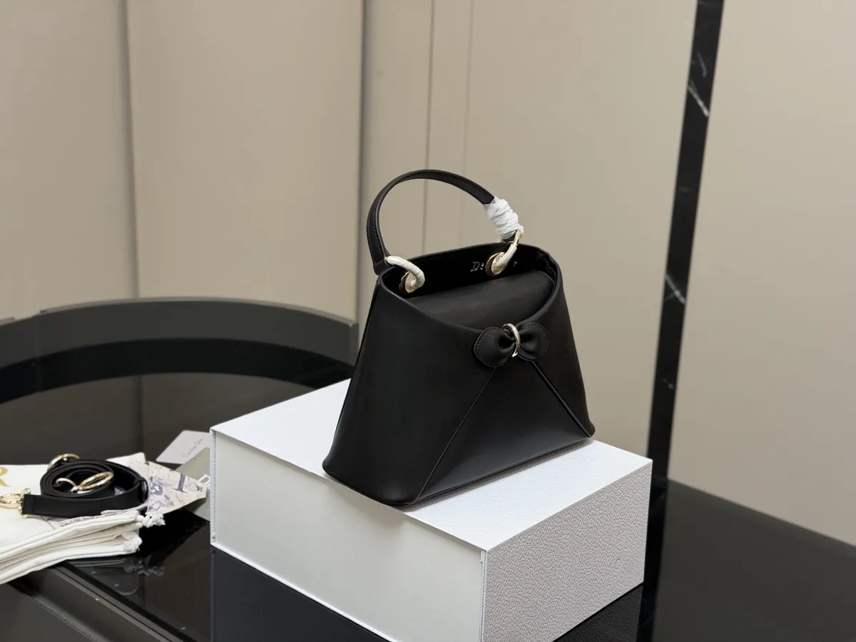 Dior Bow Top Handle Bag - 26 × 17 cm — source photograph 1 of 3