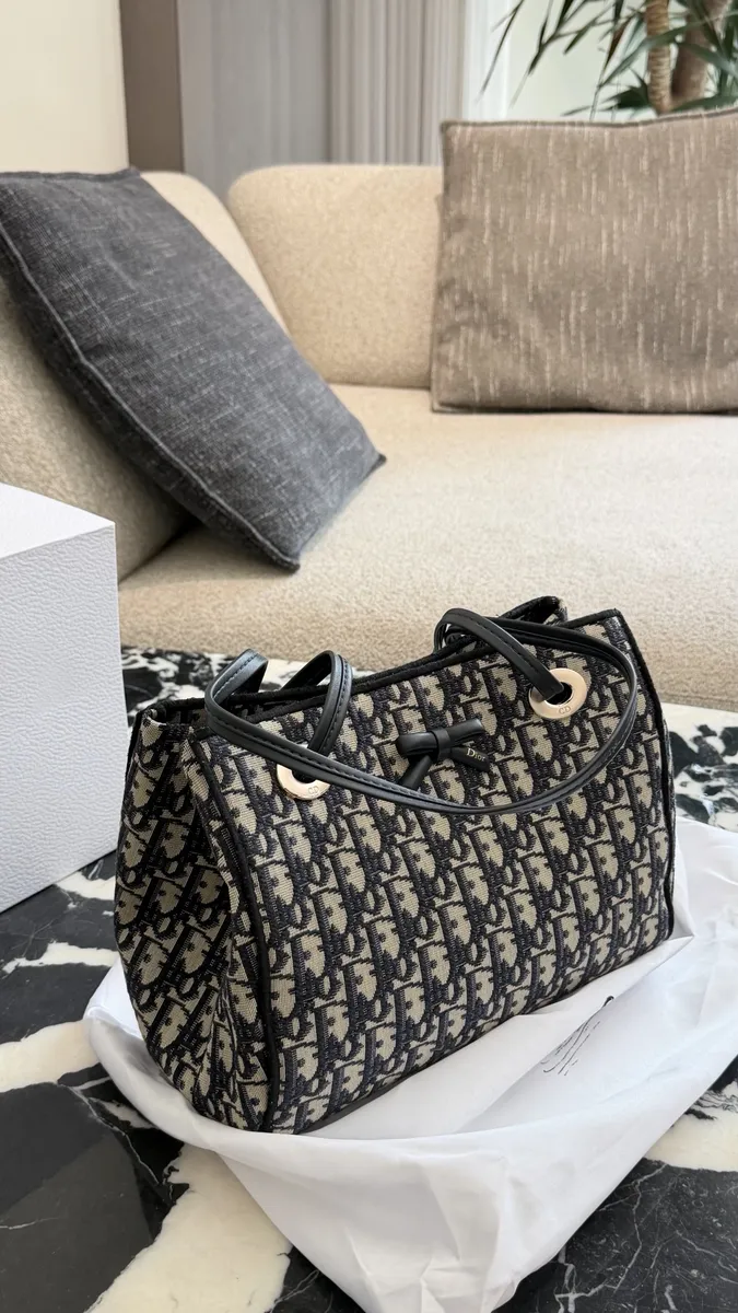 Dior Woven Bow Handbag — source photograph 1 of 3