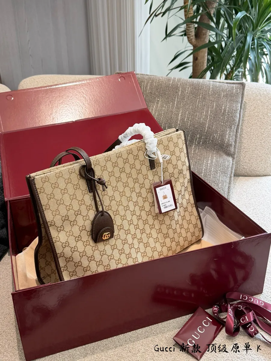 Gucci Canvas Monogram Tote Bag - 35 cm — source photograph 1 of 3
