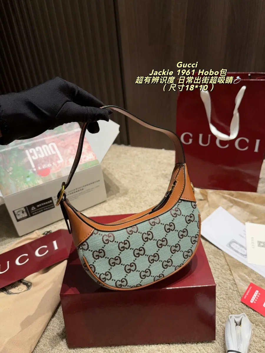 Gucci Jackie Canvas Monogram Crossbody Bag — source photograph 1 of 3