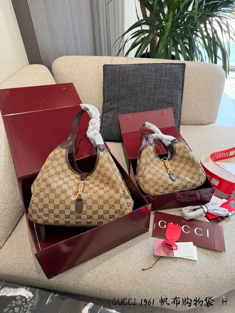 Gucci Jackie Canvas Monogram Shoulder Bag - 31 cm Options — source photograph 1 of 3