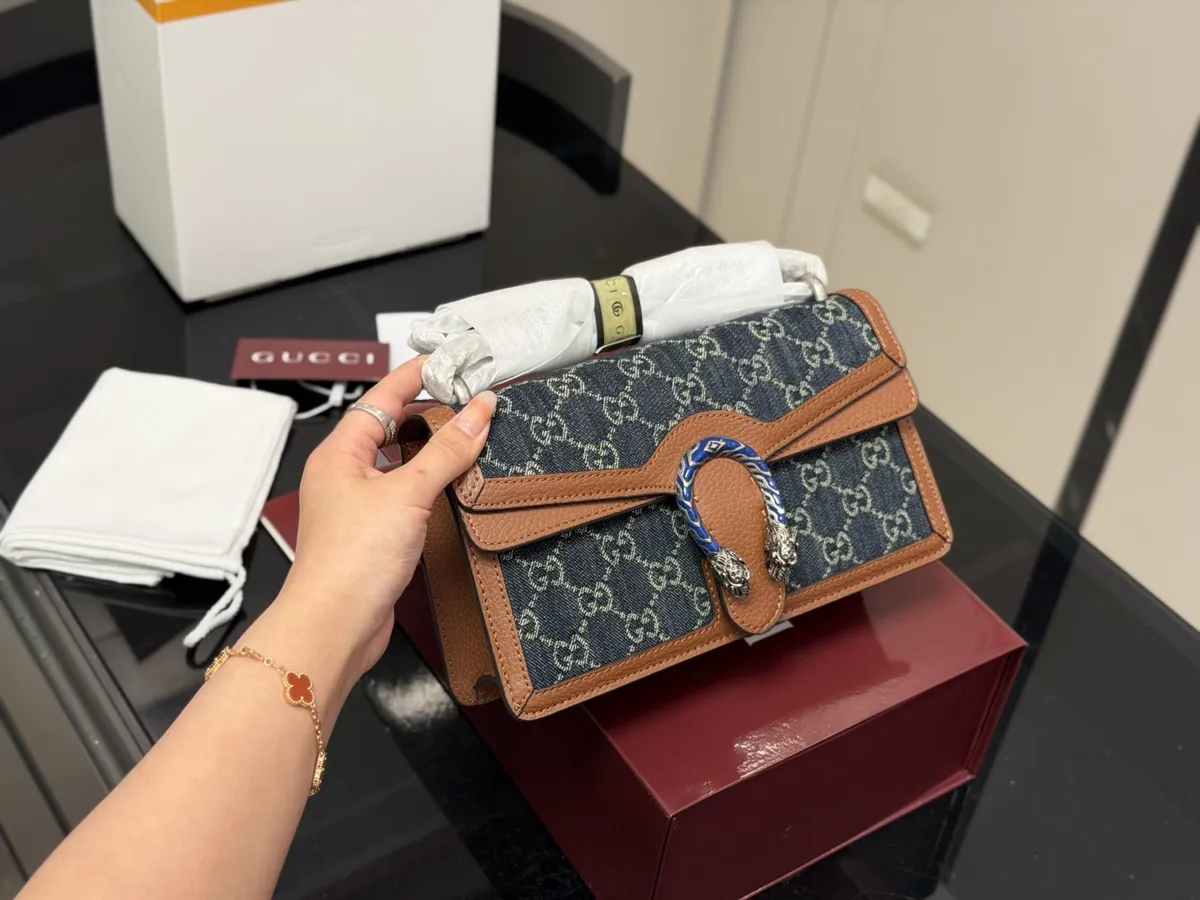 Gucci Monogram Handbag - 25 cm — source photograph 1 of 3