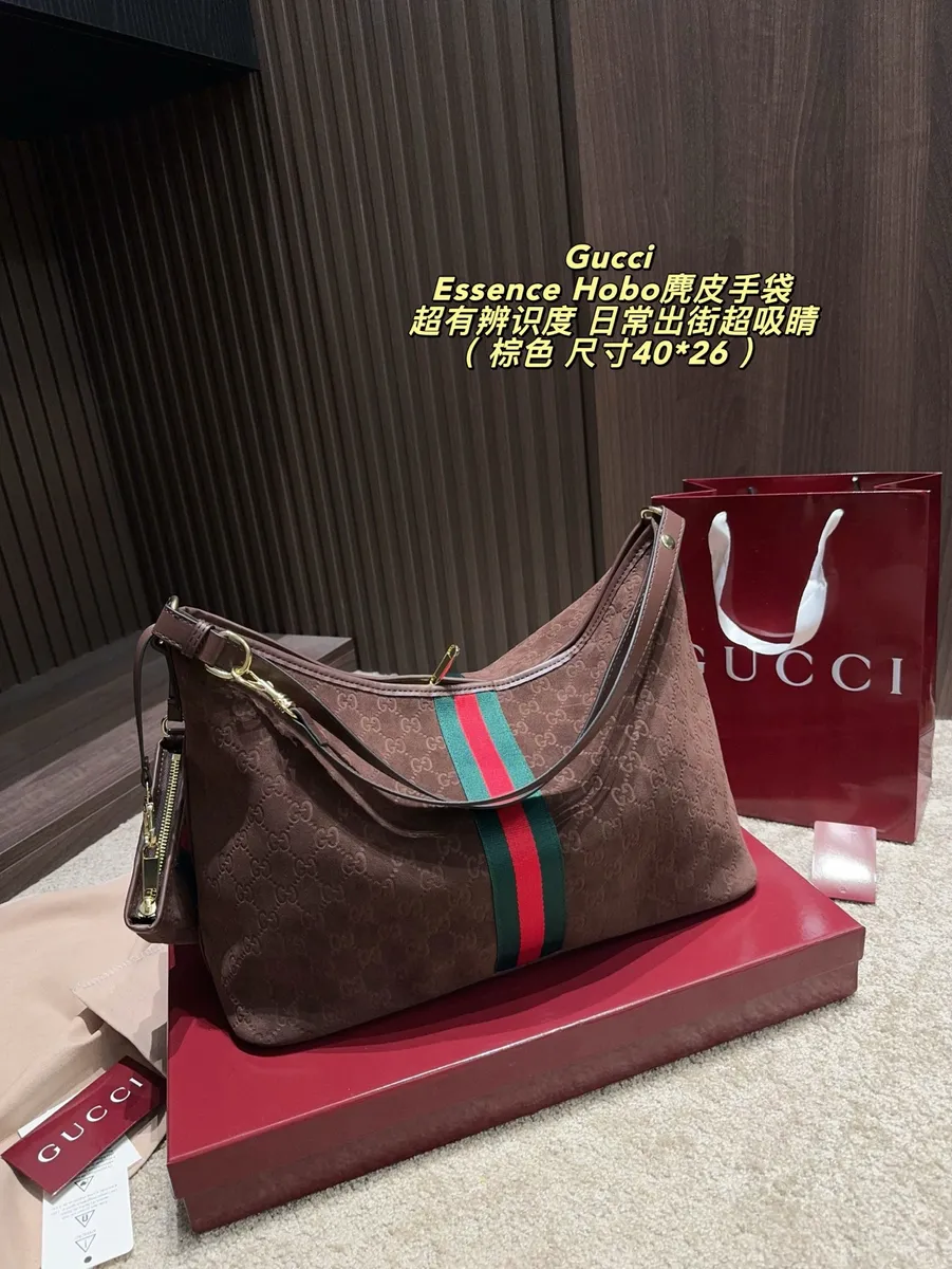 Gucci Suede Monogram Crossbody Bag - 40 × 26 cm — source photograph 1 of 3