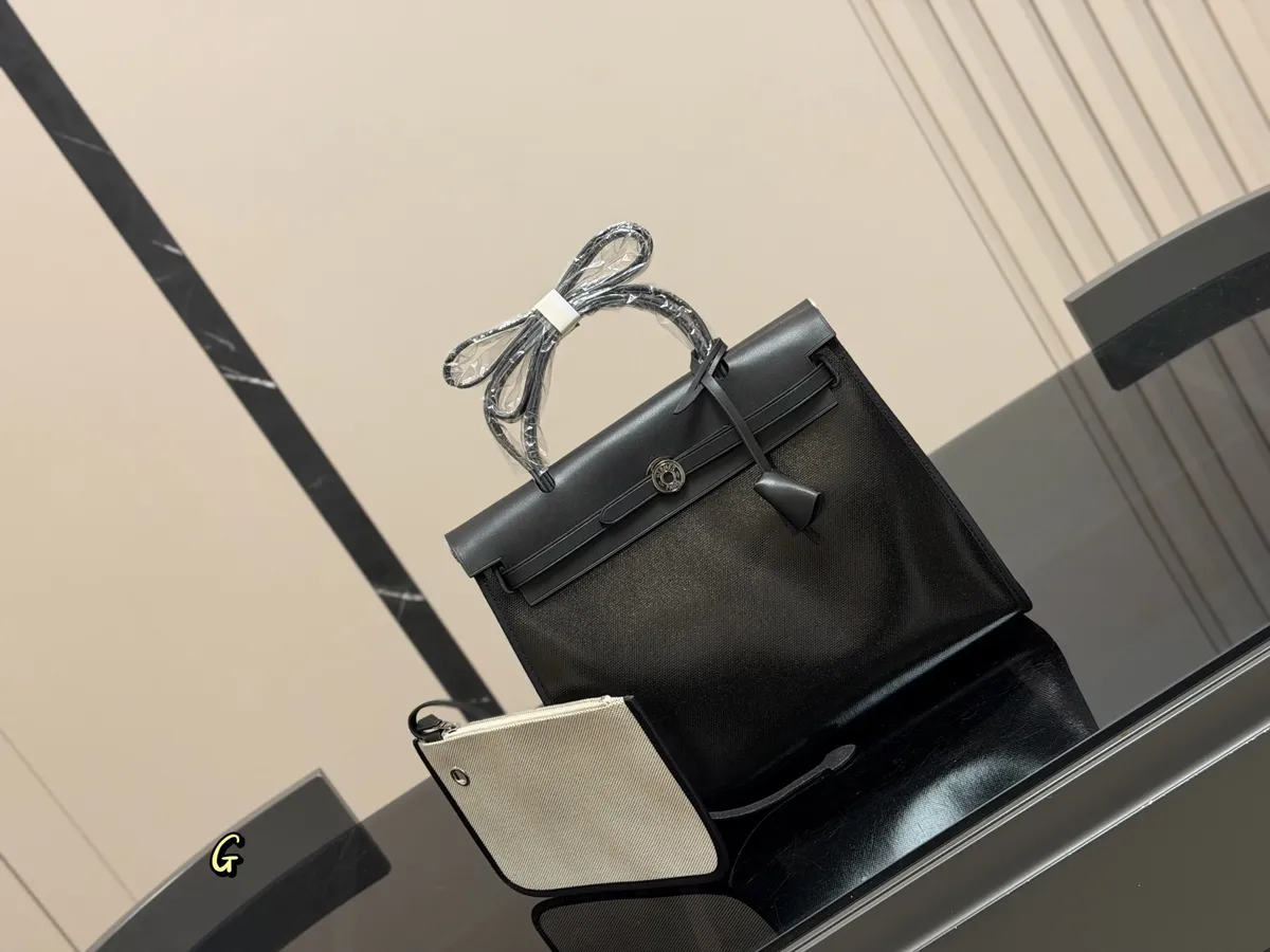 Hermès Herbag Canvas Crossbody Bag - 30 × 25 cm — source photograph 1 of 3