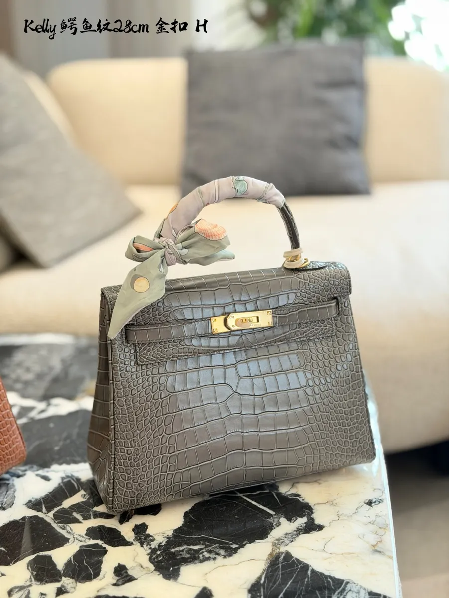 Hermès Kelly Croc Embossed Shoulder Bag - 28 cm — source photograph 1 of 3
