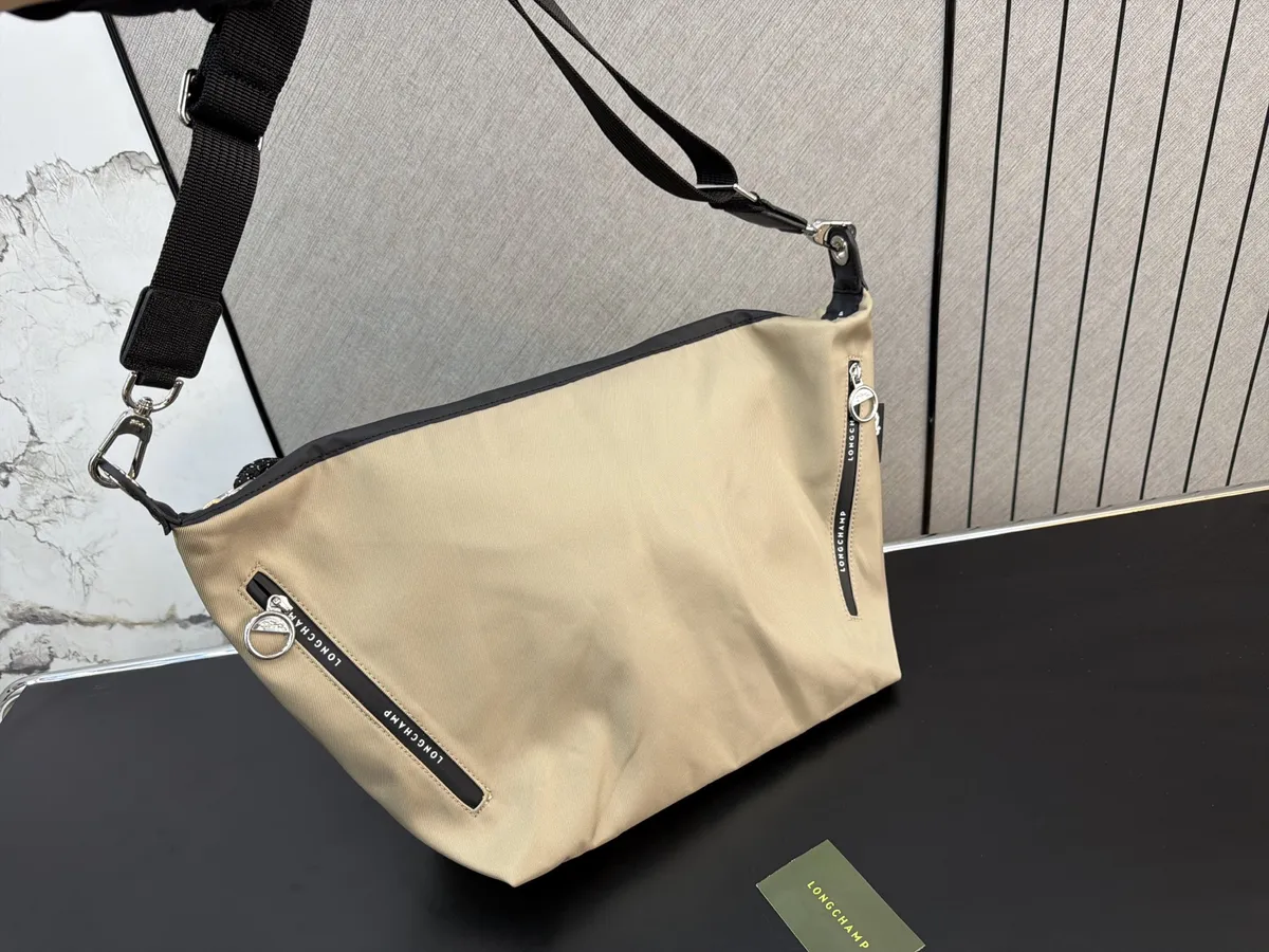 Longchamp Le Pliage Canvas Backpack - 29 × 24 cm — source photograph 1 of 3