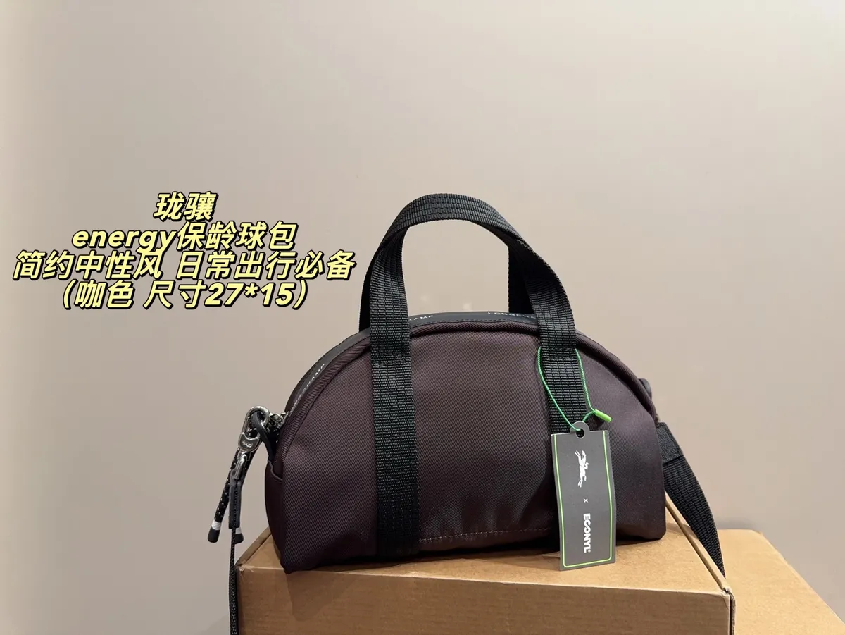 Longchamp Nylon Handbag — source photograph 1 of 3
