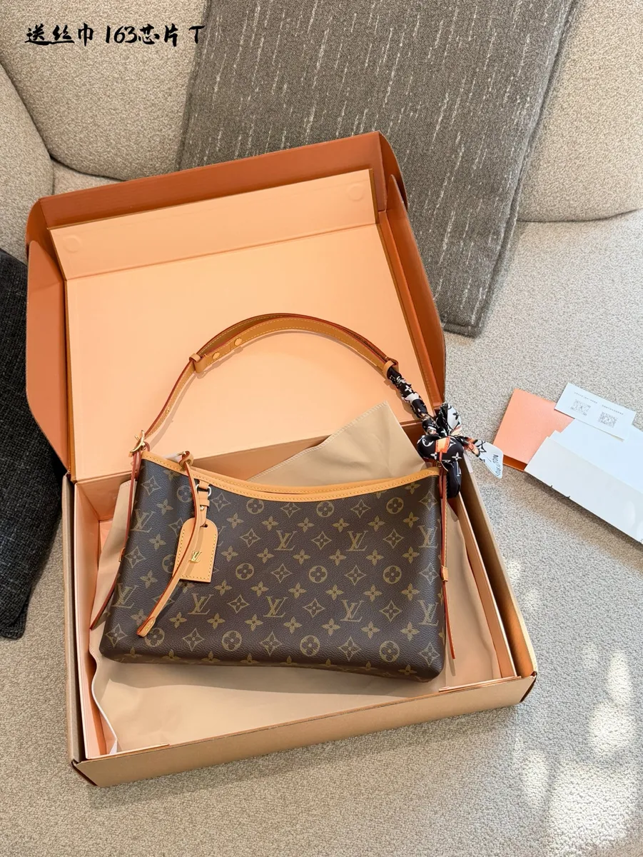 Louis Vuitton CarryAll Canvas Monogram Crossbody Bag - 35 cm — source photograph 1 of 3
