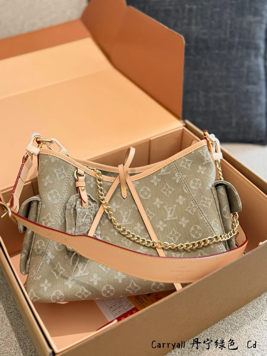Louis Vuitton CarryAll Denim Monogram Crossbody Bag - 29 × 12 × 24 cm — source photograph 1 of 3