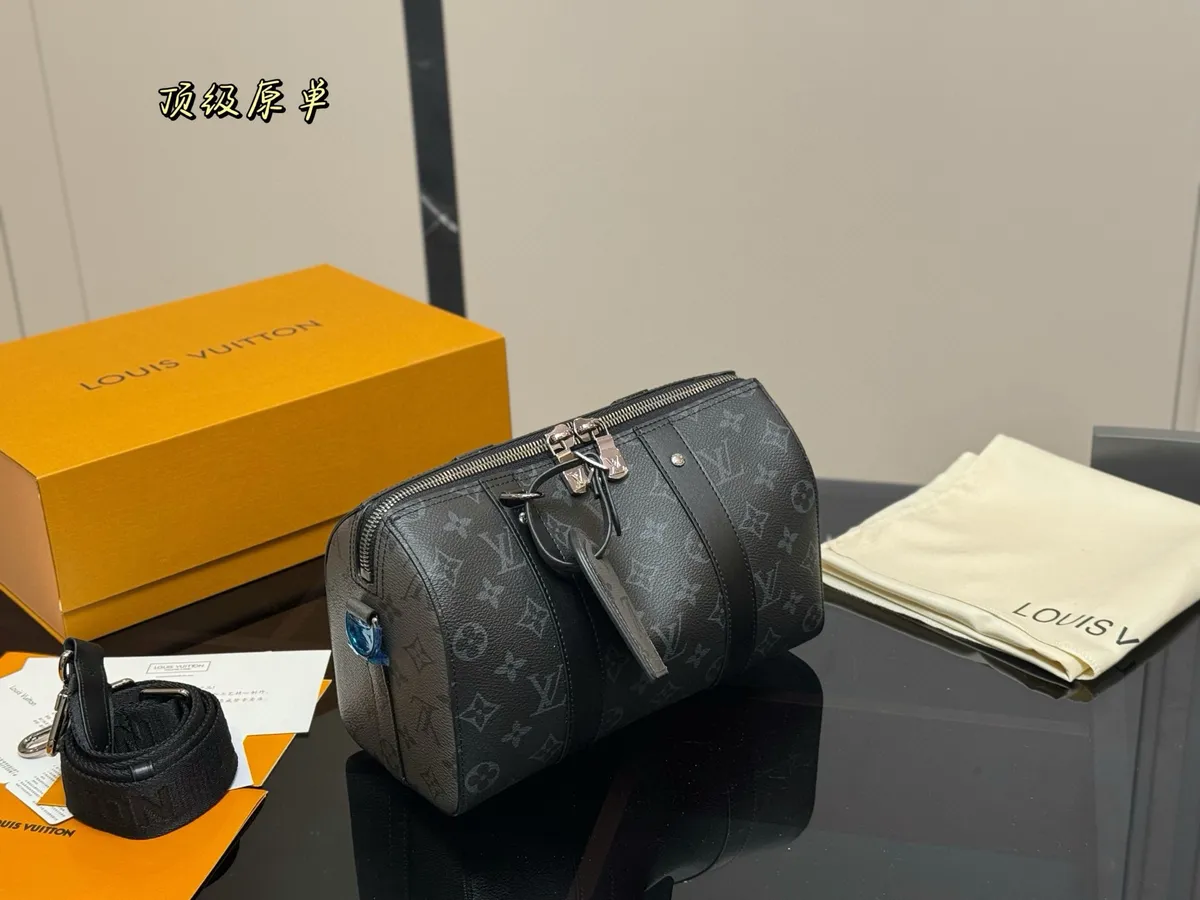 Louis Vuitton Keepall Monogram Satchel Bag - 27 × 17 cm — source photograph 1 of 3