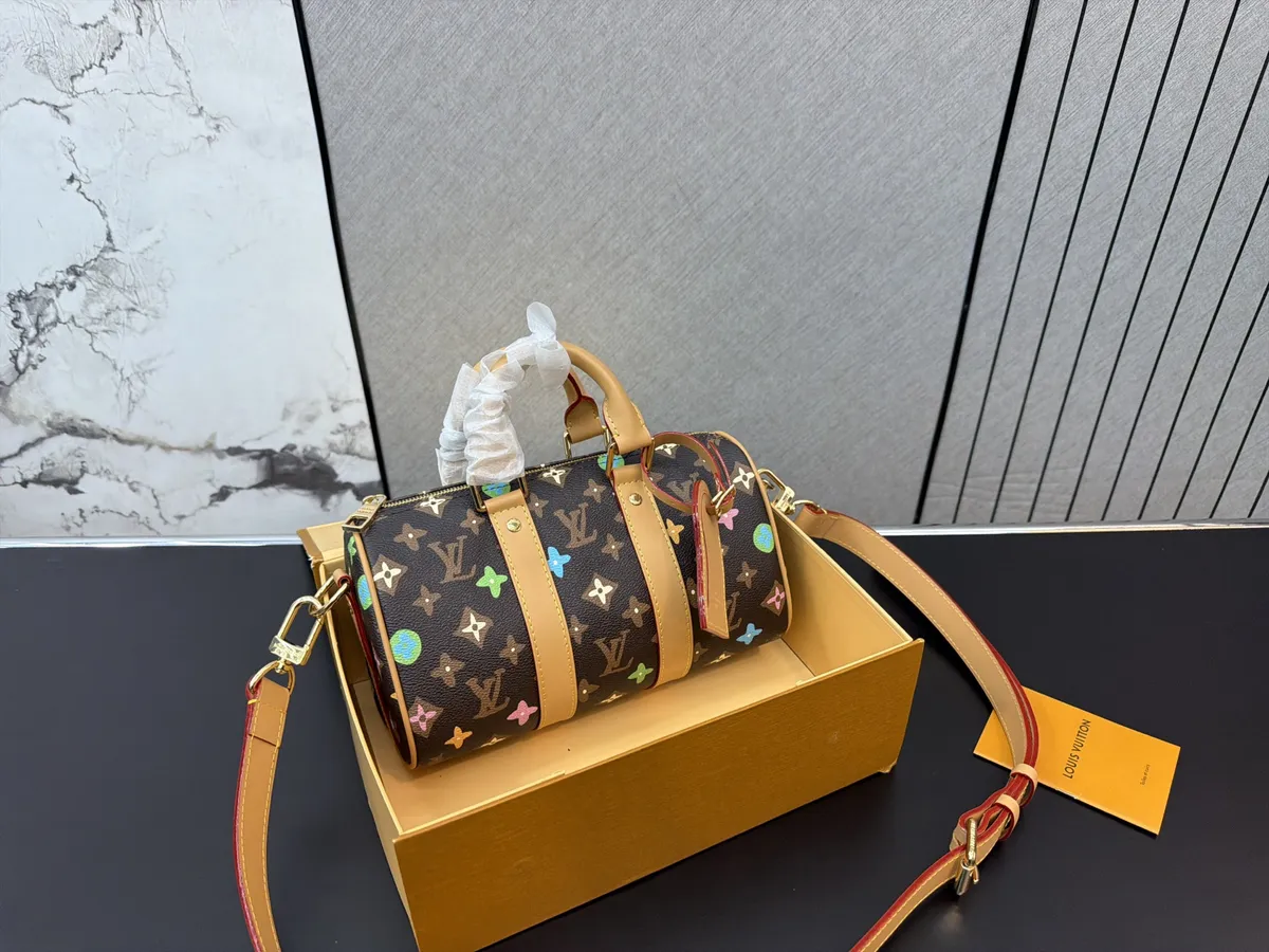 Louis Vuitton Keepall Printed Crossbody Bag - 25 cm — source photograph 1 of 3