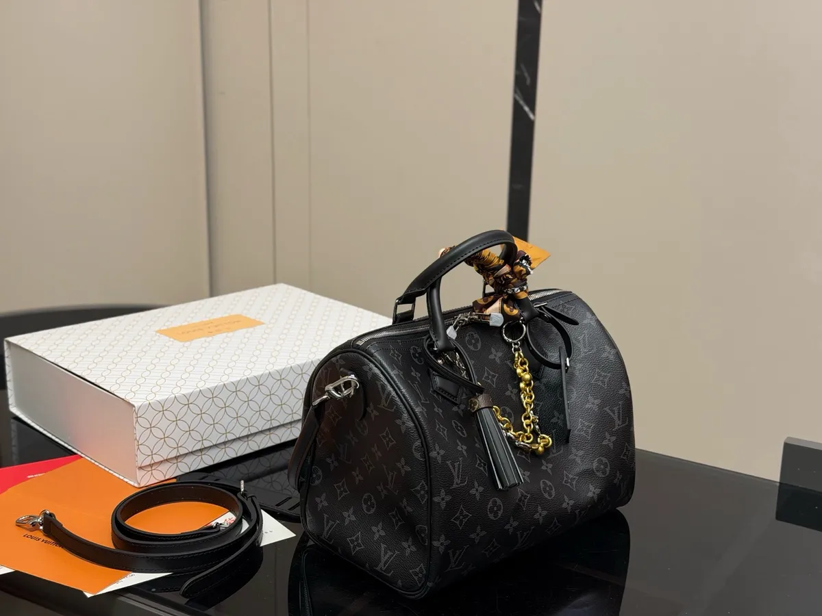 Louis Vuitton Keepall Satchel Bag - 30 cm — source photograph 1 of 3