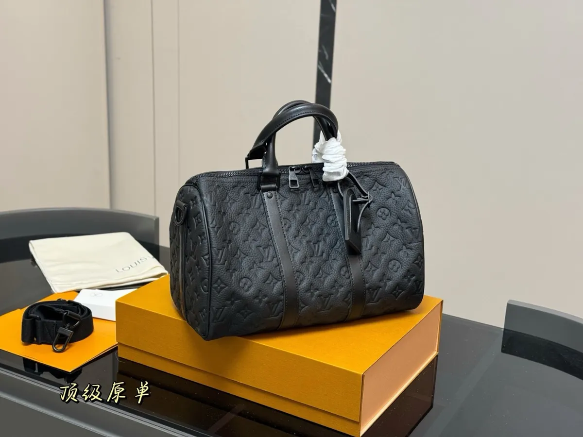 Louis Vuitton Keepall Satchel Bag - 35 × 22 cm — source photograph 1 of 3