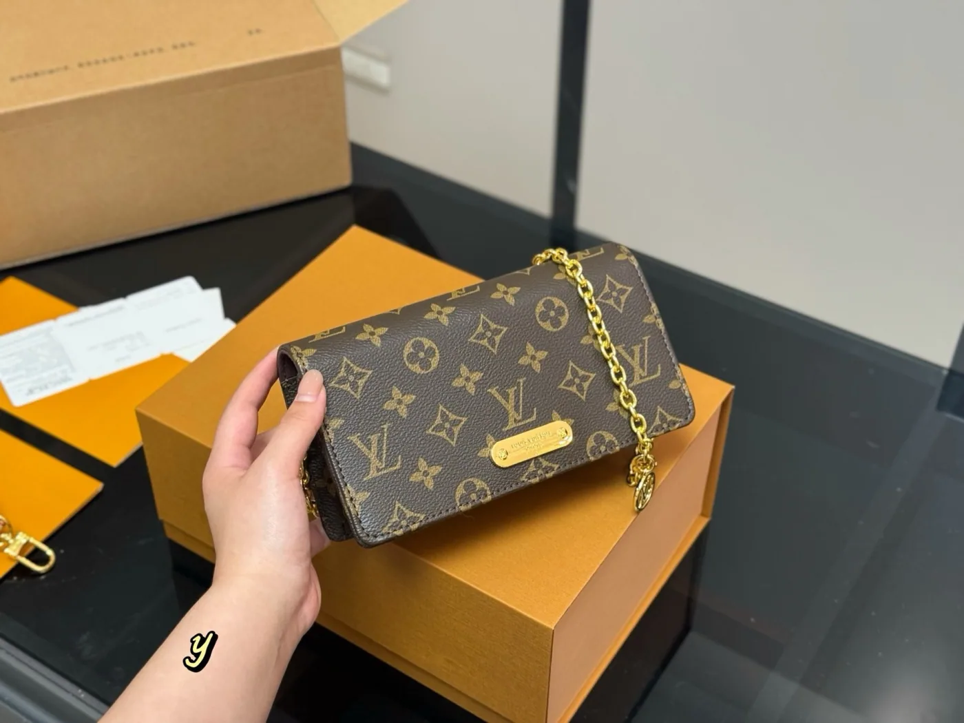Louis Vuitton Lily Monogram Wallet on Chain, brown — front view