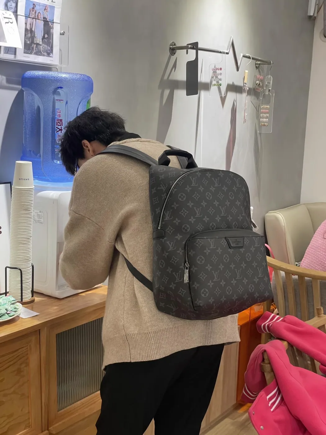 Louis Vuitton Monogram Backpack, black and grey — carried rear view