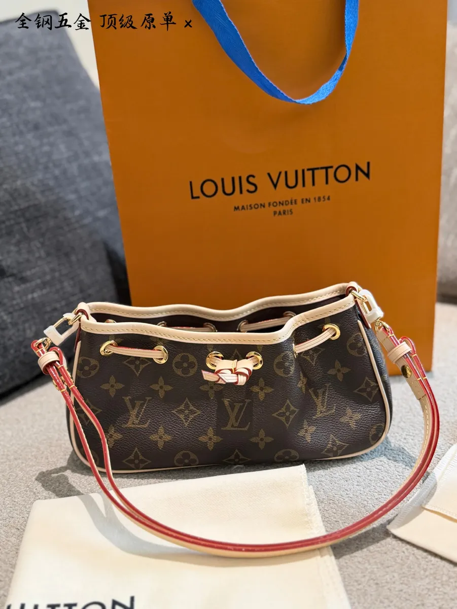 Louis Vuitton Nano Monogram Crossbody Bag — source photograph 1 of 3