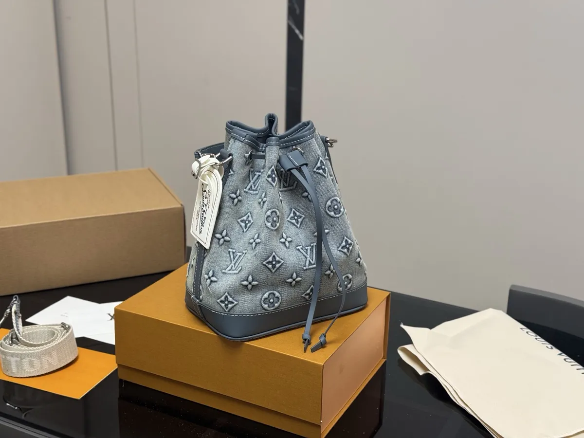 Louis Vuitton Nice Denim Bucket Bag - 21 × 24 cm — source photograph 1 of 3