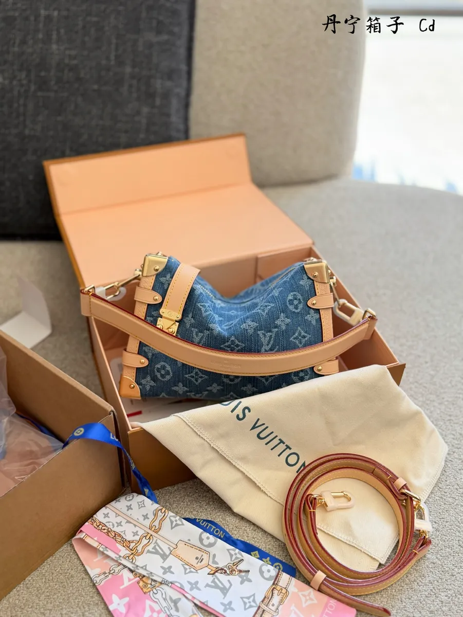 Louis Vuitton Side Trunk Denim Monogram Crossbody Bag - 21 × 16 × 14 cm — source photograph 1 of 3