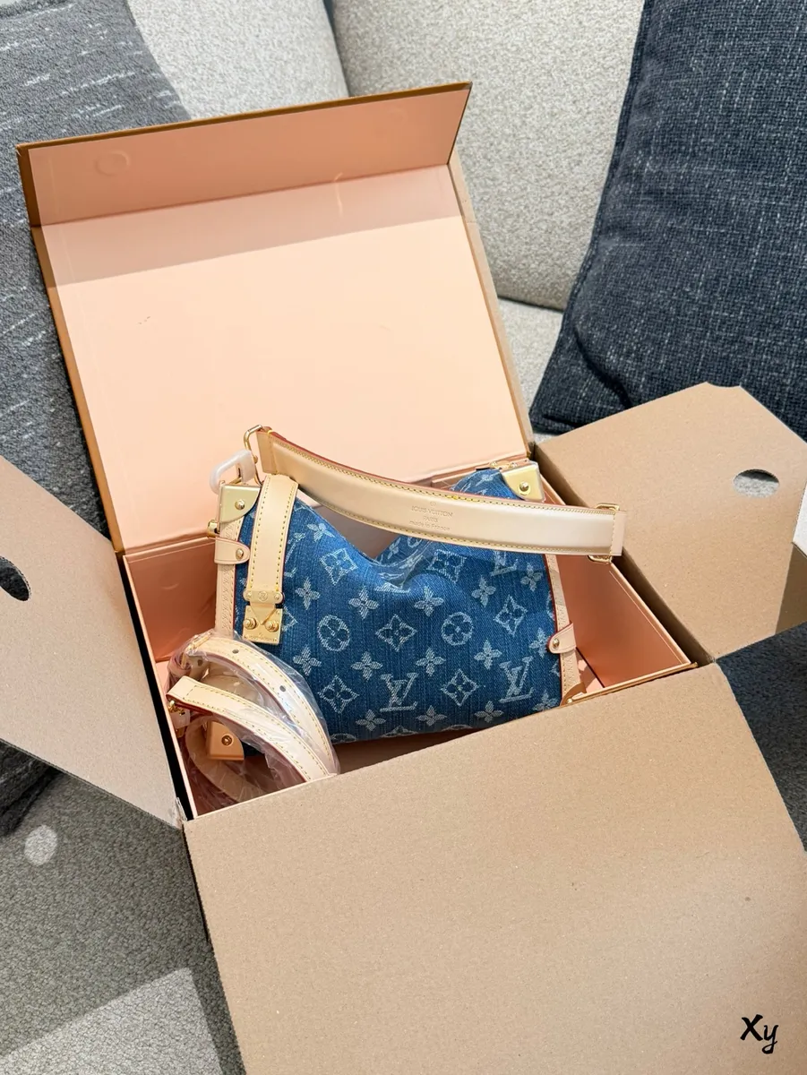 Louis Vuitton Side Trunk Denim Monogram Crossbody Bag - 23 cm — source photograph 1 of 3