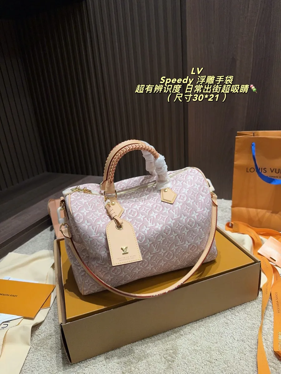 Louis Vuitton Speedy Woven Canvas Satchel Bag — source photograph 1 of 3