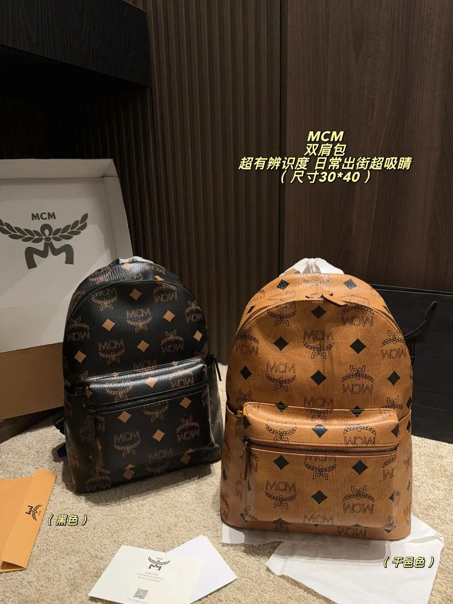 MCM Canvas Monogram Backpack — source photograph 1 of 3