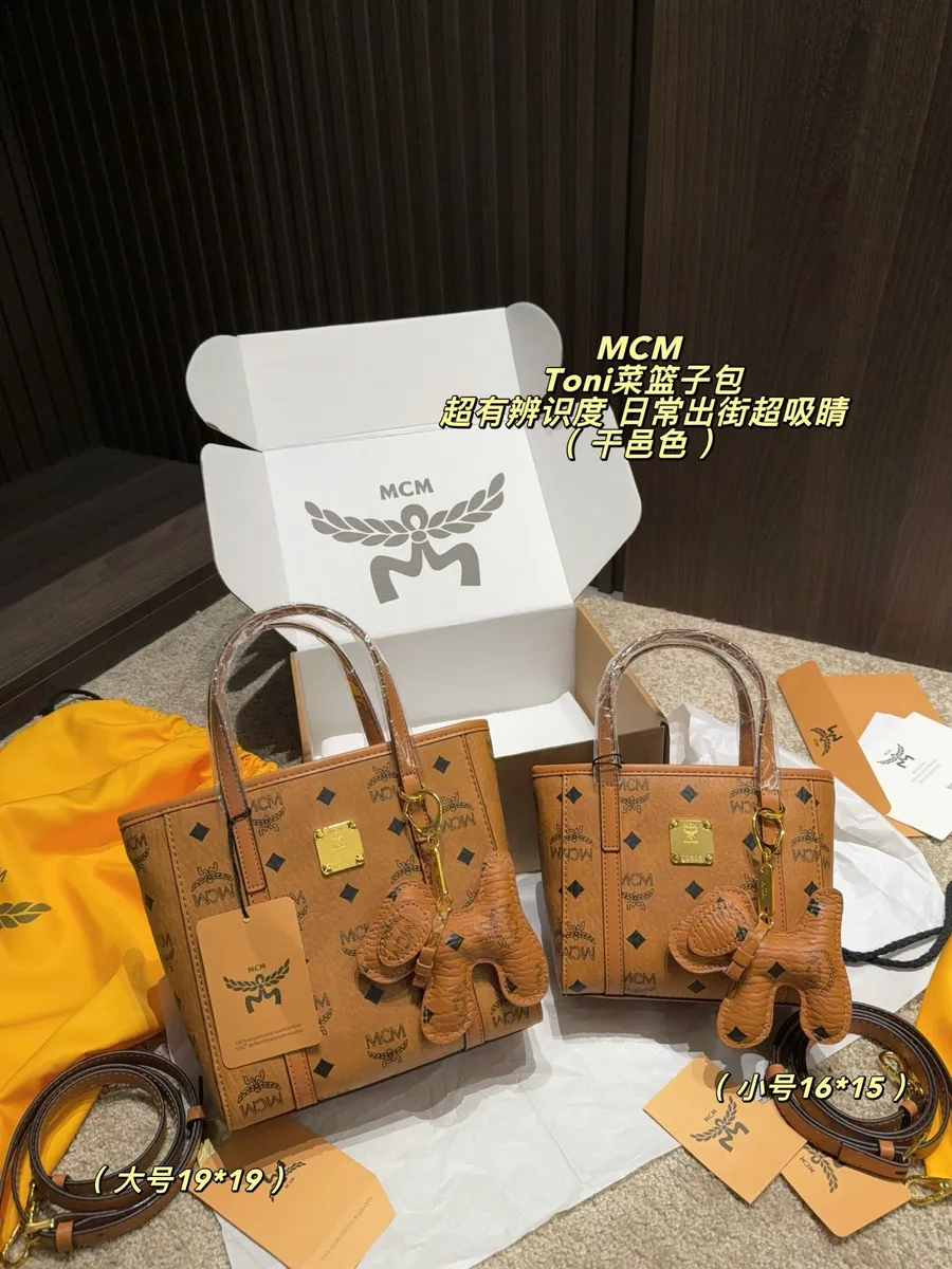 MCM Canvas Monogram Bucket Bag — source photograph 1 of 3