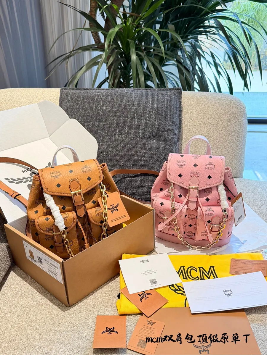 MCM Canvas Printed Backpack — source photograph 1 of 3