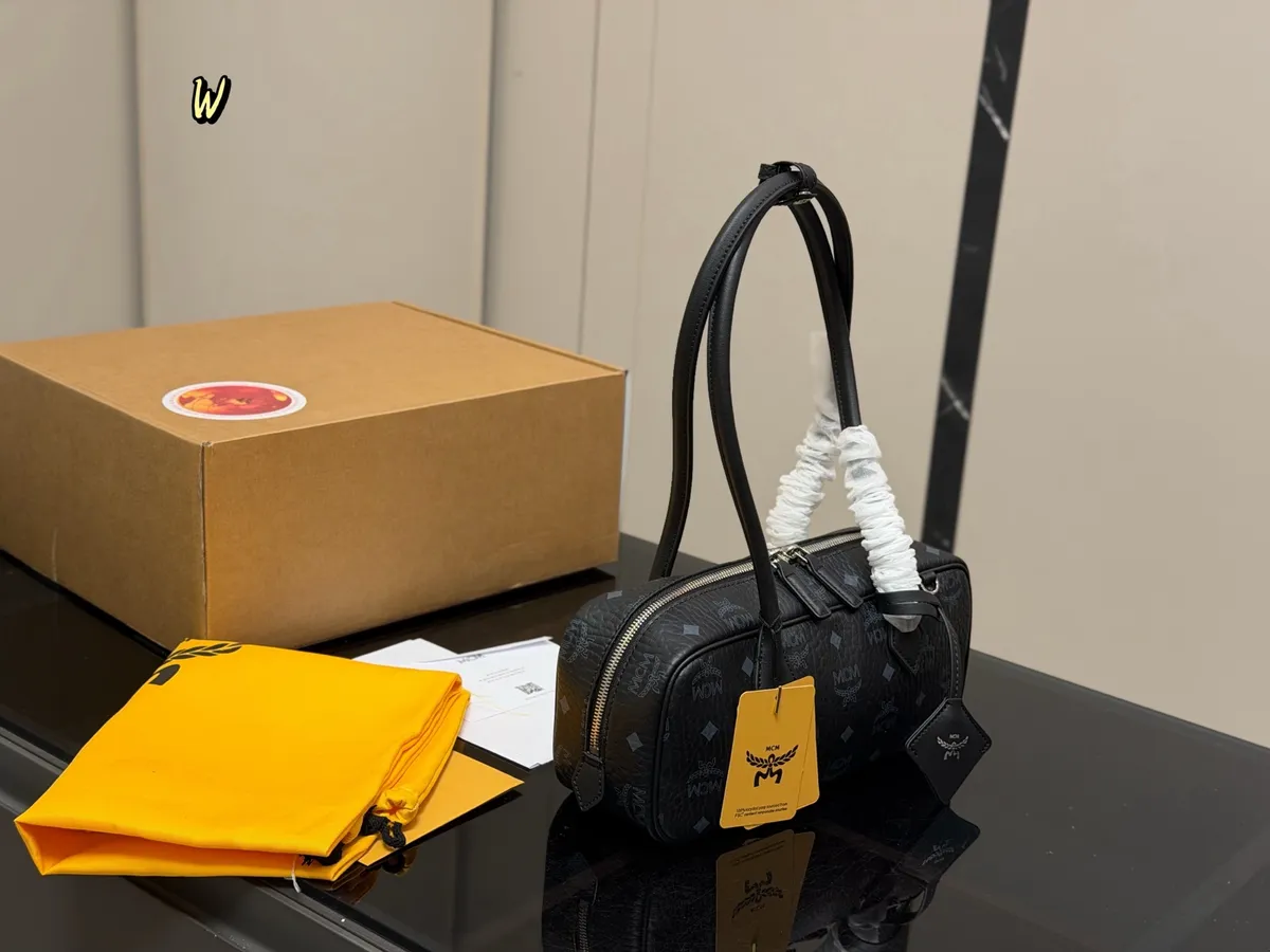 MCM Handbag - 28 × 12 cm — source photograph 1 of 3