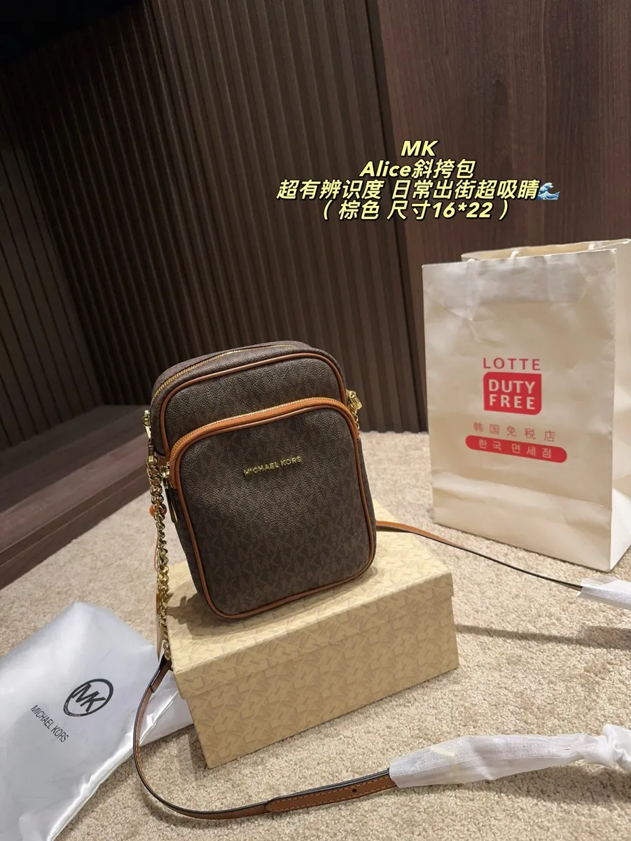 Michael Kors Canvas Monogram Camera Bag — source photograph 1 of 3