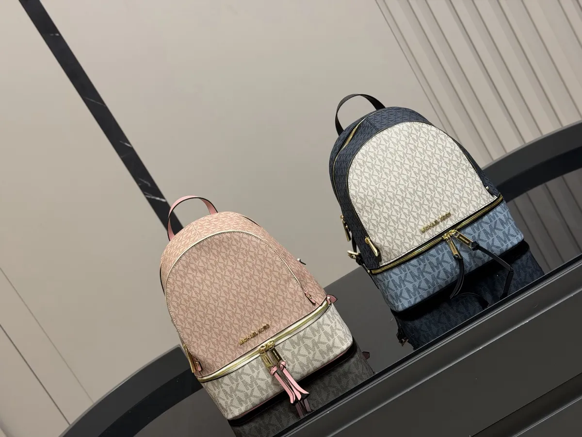 Michael Kors Printed Backpack - 30 × 32 cm — source photograph 1 of 3