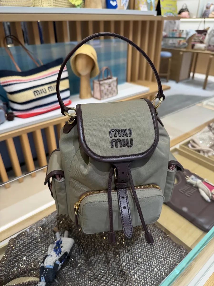 Miu Miu Canvas Handbag — source photograph 1 of 3