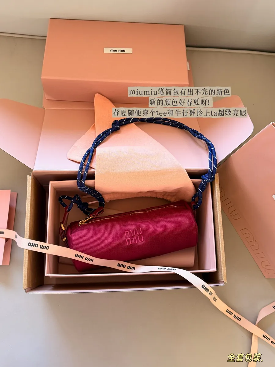 Miu Miu Canvas Mini Bag - 23 × 10 cm — source photograph 1 of 3
