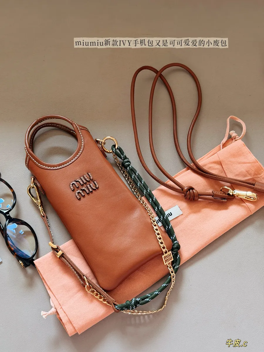 Miu Miu Crossbody Bag - 10.5 × 18 cm — source photograph 1 of 3