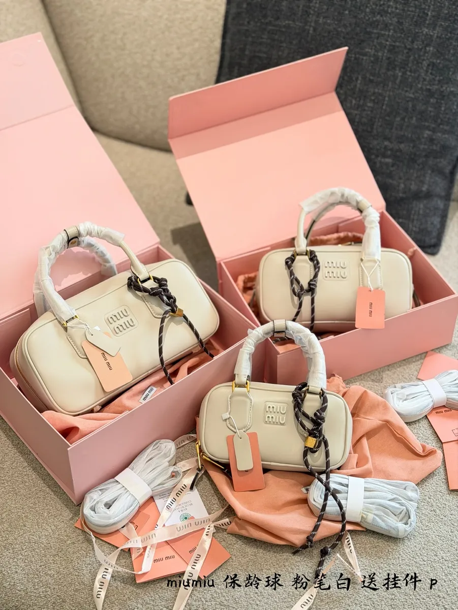 Miu Miu Crossbody Bag - 20 cm Options — source photograph 1 of 3