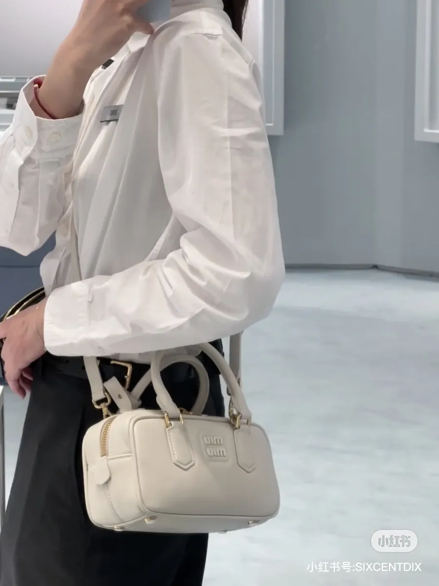 Miu Miu Crossbody Bag — source photograph 1 of 3