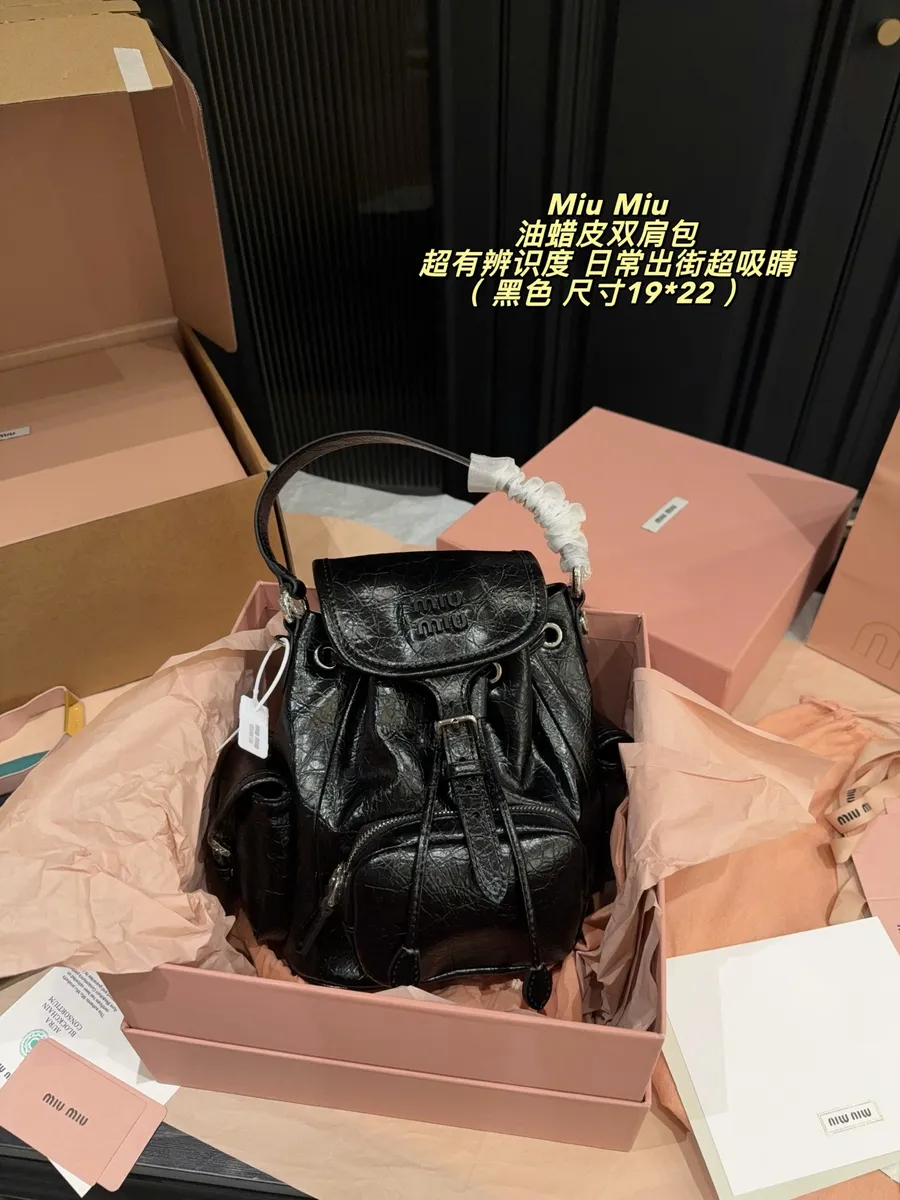 Miu Miu Flap Drawstring Backpack — source photograph 1 of 3