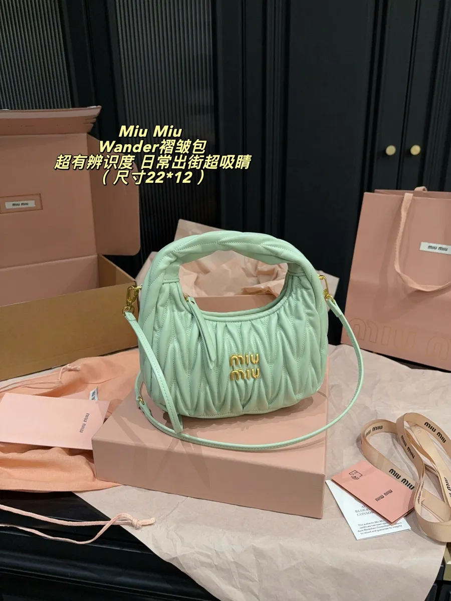 Miu Miu Matelassé Crossbody Bag — source photograph 1 of 3